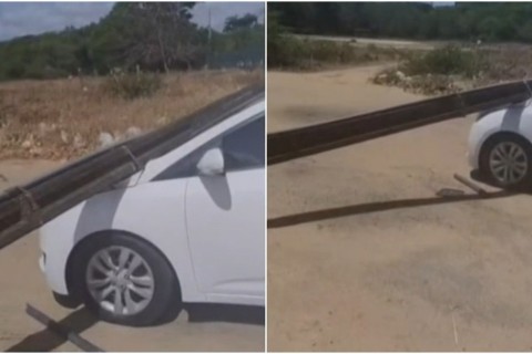Poste cai sobre carro e dona do veículo fica no prejuízo